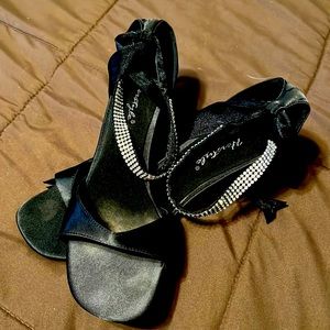 Black strap and sparkly heels